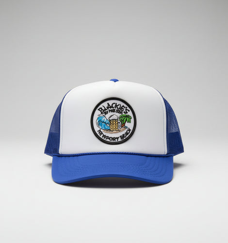 Polyester and nylon trucker hat featuring the Blackie's By the Sea emblem. Plastic adjustable snap. One size fits most.